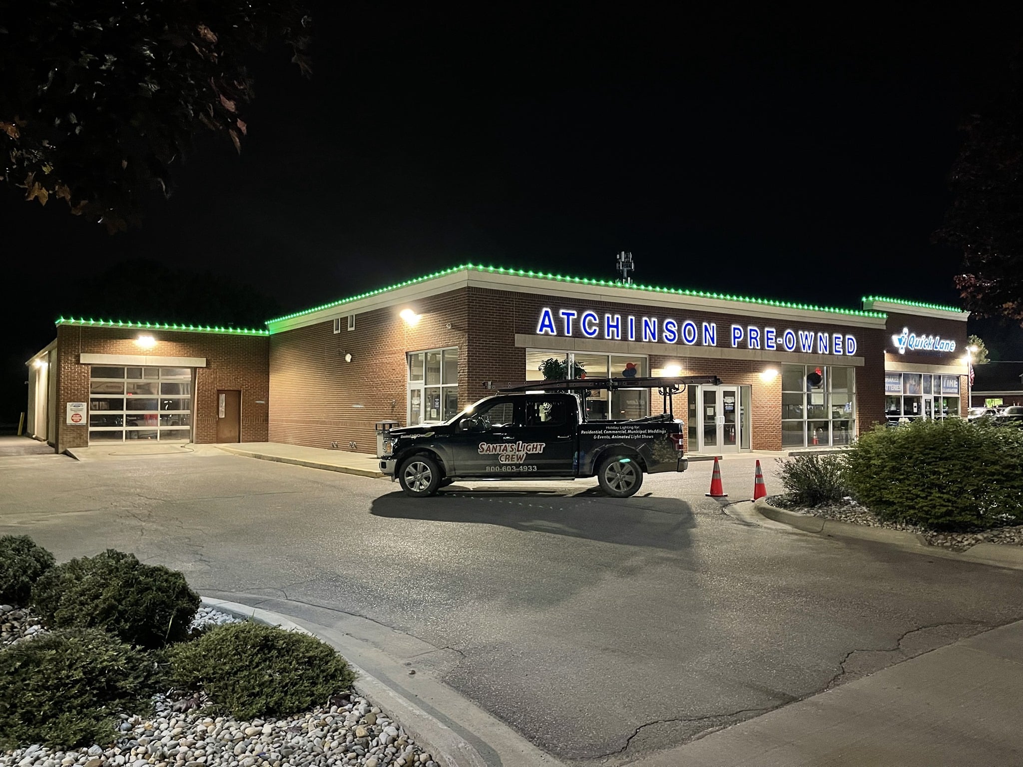 Commercial Christmas light installation on business